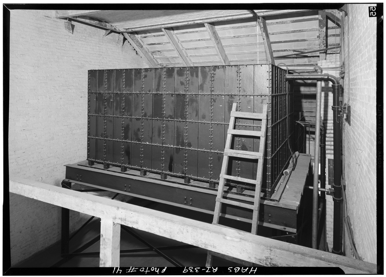 Historic survey view of a large water-storage tank in The Breakers attic