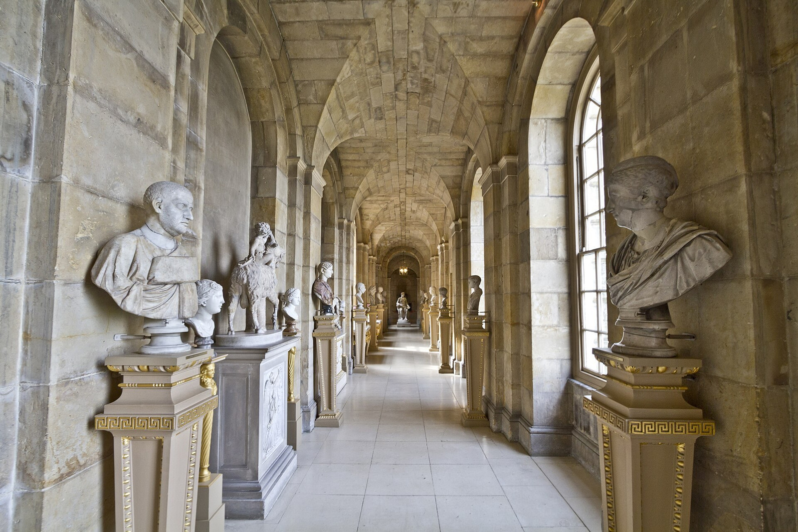 Stone passage lined with classical busts at Castle Howard