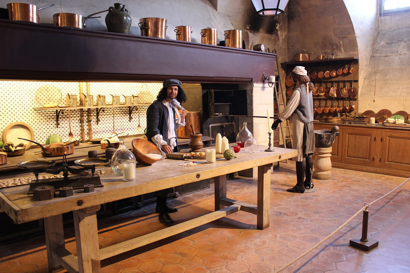 The historic kitchen at Vaux-le-Vicomte with hearths and copper cookware